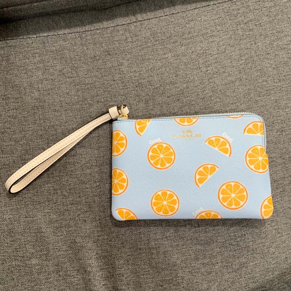 Coach blue with oranges wristlet